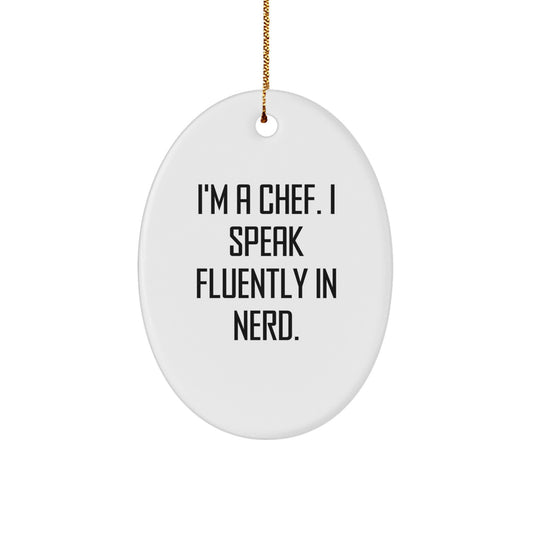 Chef Gifts from Friends - 'I'm A Chef. I Speak Fluently In genius.' Oval Ornament for Men, Women, and Family at Christmas - Image 1