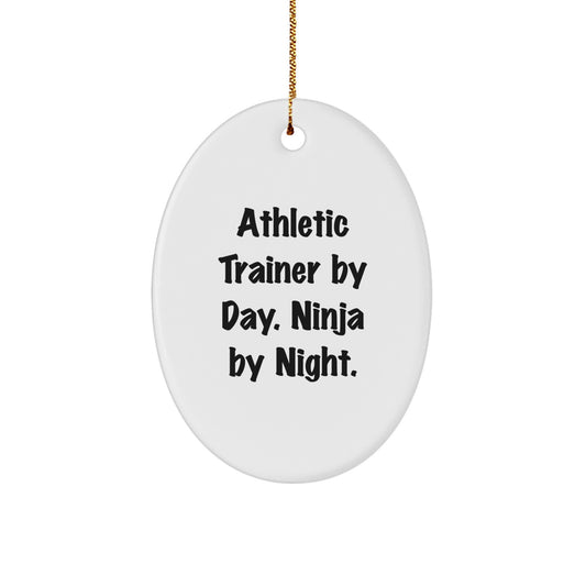 Athletic Trainer By Day, Ninja By Night Oval Ornament, Funny Gifts from Friends for Christmas - Image 1